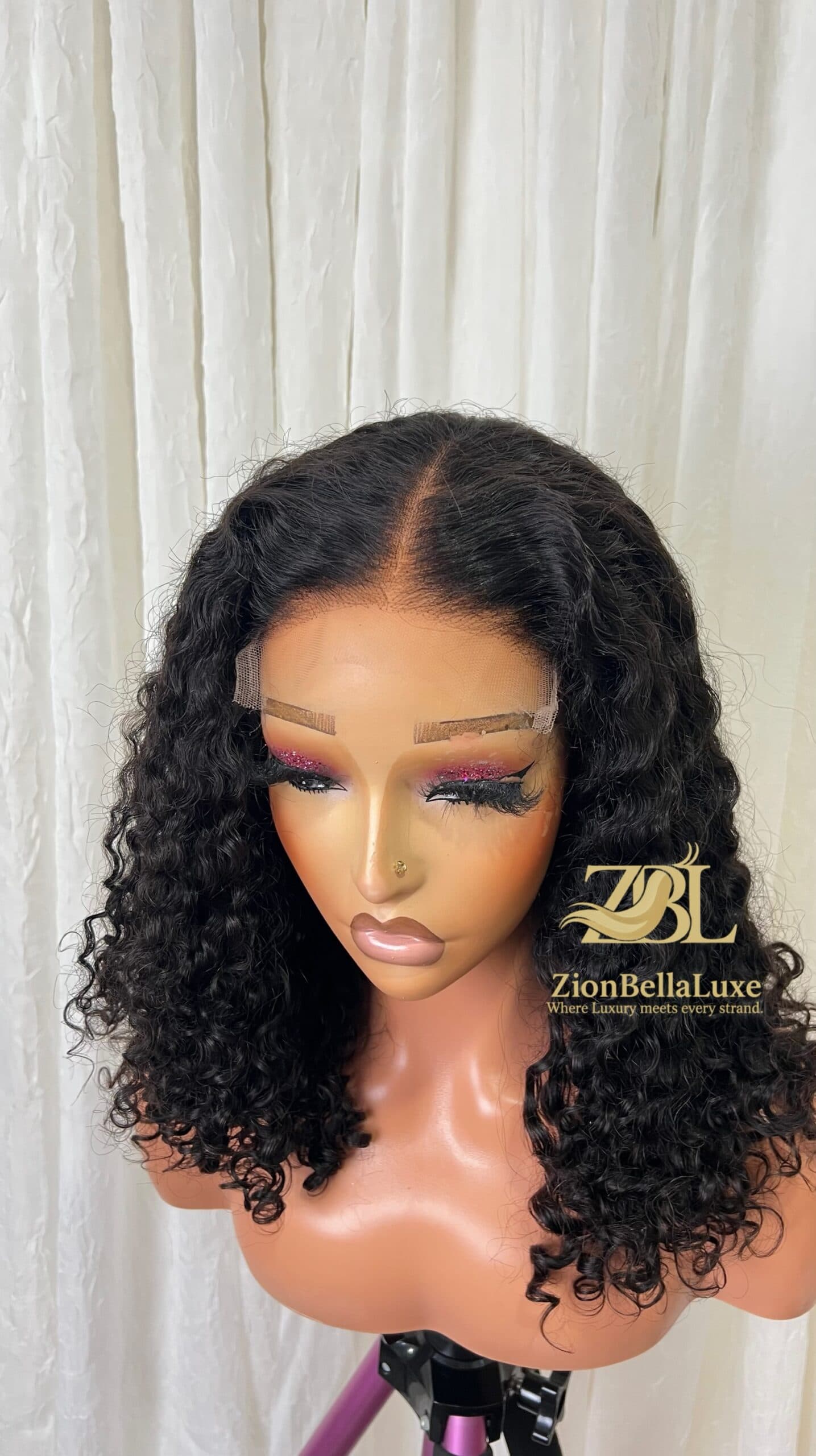 Tumi Curls: Natural black Burmese Curls with 5*5 HD Lace 16 inches